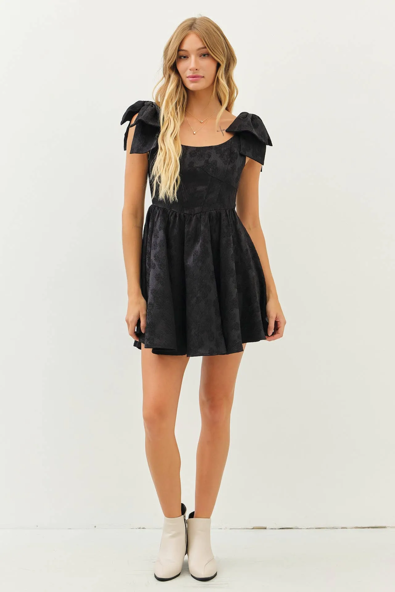 LOVELY TEXTURED FLARE MINI DRESS WITH BOW STRAPS